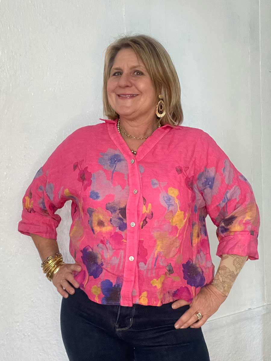 buttonup-watercolor-linen-top-fuchsia Lady showing bright pink color of the Italian linen floral top.